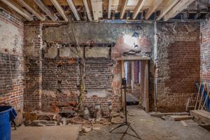 Dresser in kichen was placed before brick partition seperating t