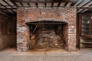Cellar kitchen fireplace in 1771 wing