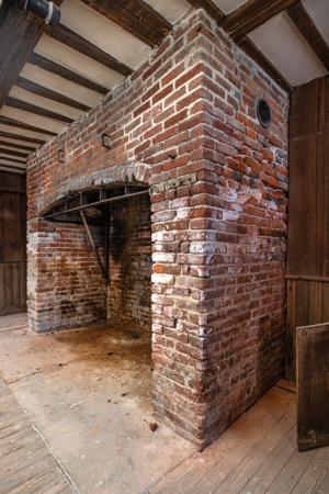 Cellar kitchen fireplace in 1771 wing