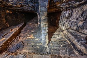 Split flues in cellar  kitchen fireplace in 1771 wing