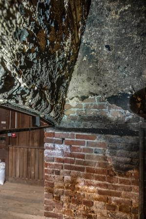 Back of arch in cellar kitchen fireplace in 1771 wing